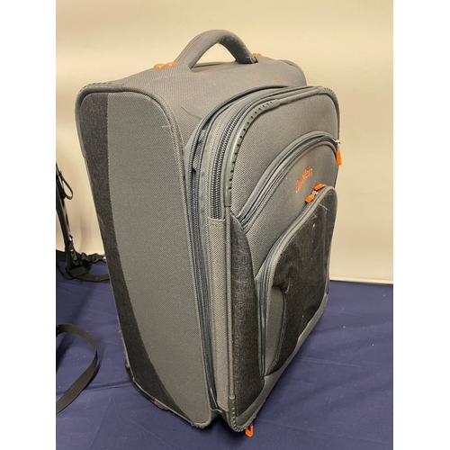 79 - Calvin Klein Travel Suitcase + Manfrotto Camera Backpack