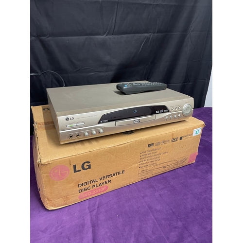 43 - LG DVD player in box with remote