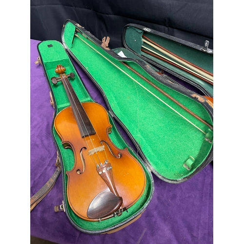 91 - Two Violins in cases