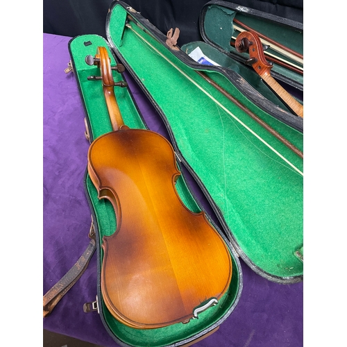 91 - Two Violins in cases