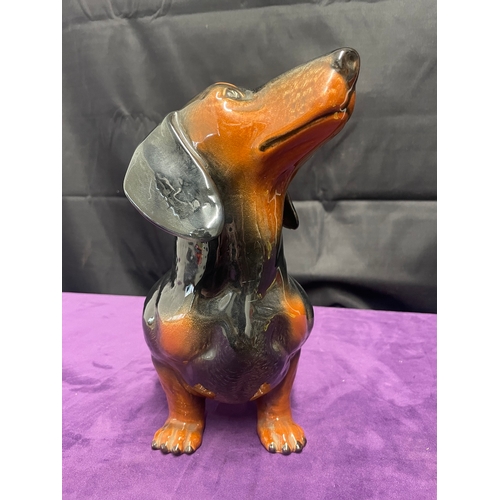 111 - Large porcelain Sitting Dachshund Dog by Beswick  Ornament 33cm x 27cm