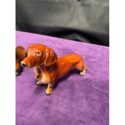 112 - Collection of porcelain Dachshund Dog Ornaments