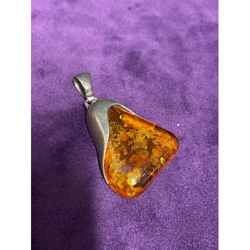 226 - Two vintage pendants + crackled amber resin egg / ring