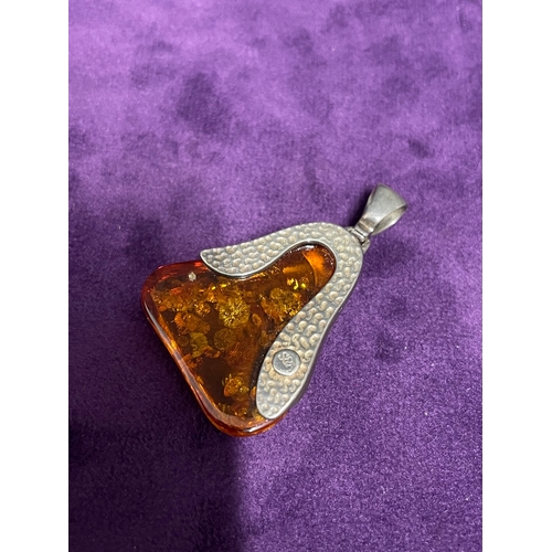 226 - Two vintage pendants + crackled amber resin egg / ring