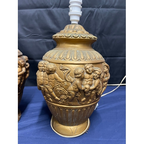 238 - A Vintage pair of gilded plaster table lamps with cherub decoration- 38cm