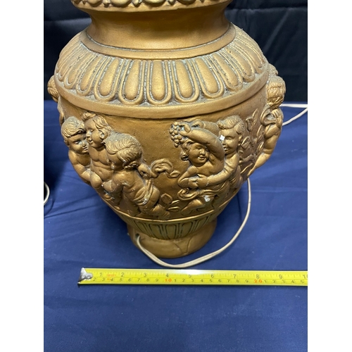 238 - A Vintage pair of gilded plaster table lamps with cherub decoration- 38cm