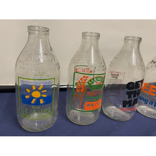 241 - Collection of vintage branded milk bottles