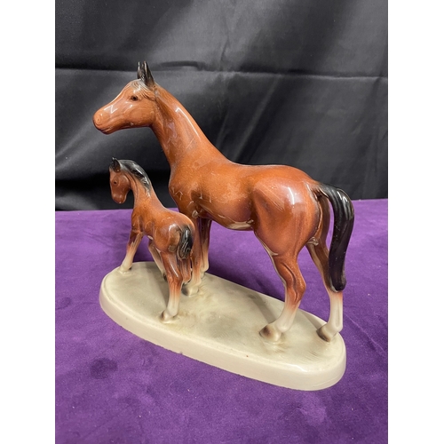 325 - Three ceramic horses