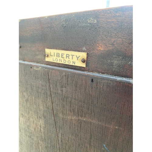 394 - Early 20th Century Slim Oak bookcase with leaded glass cupboard - Liberty London