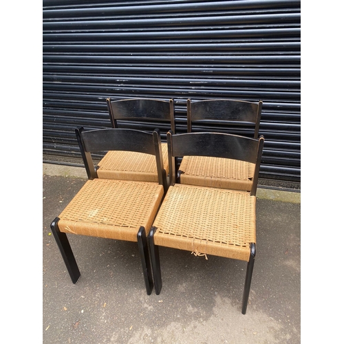 Four Ebony and Rush Dining Chairs
