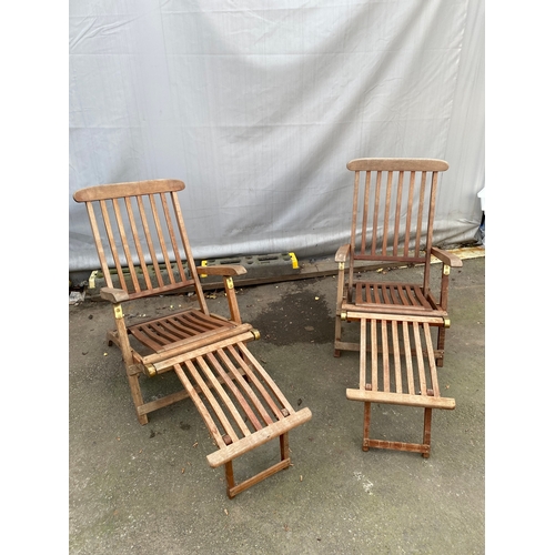 466 - Two Teak Reclining Garden Loungers / Steamers .