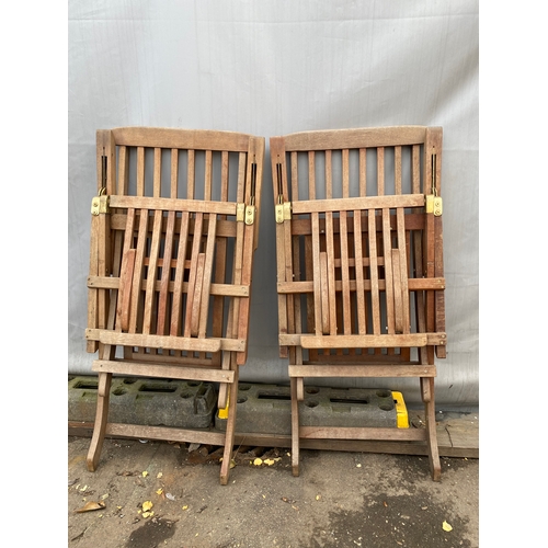 466 - Two Teak Reclining Garden Loungers / Steamers .