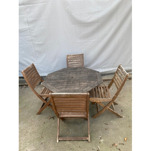 470 - Teak Garden table and 4 x chairs.