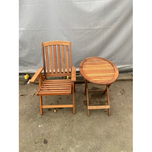 473 - Small Teak foldable table with chair. Table - length 36