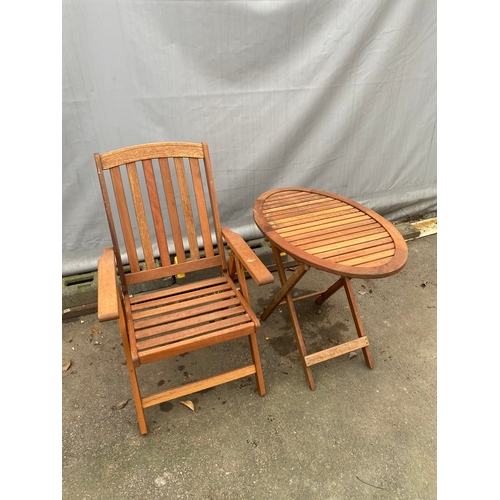 473 - Small Teak foldable table with chair. Table - length 36