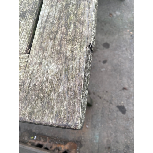 474 - Two Teak garden tables (Assorted)

Larger table - 36