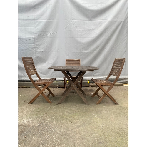 476 - Teak Garden table with 3 x foldable chairs