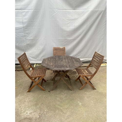 476 - Teak Garden table with 3 x foldable chairs