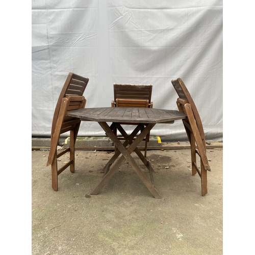 476 - Teak Garden table with 3 x foldable chairs