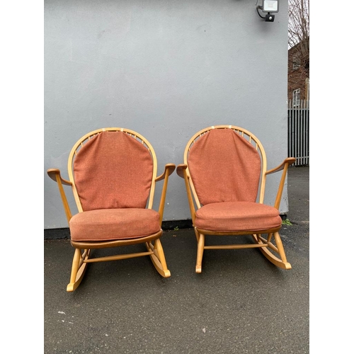 288 - 1960's Pair of ERCOL rocking chairs Grandfather Model 315

After market covers available.