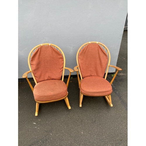 288 - 1960's Pair of ERCOL rocking chairs Grandfather Model 315

After market covers available.