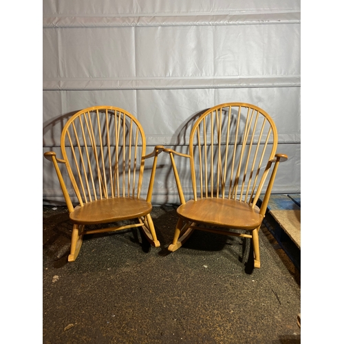 288 - 1960's Pair of ERCOL rocking chairs Grandfather Model 315

After market covers available.