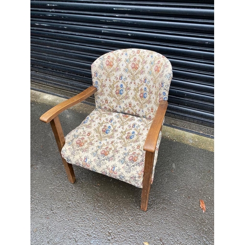 291 - Small fabric armchair.