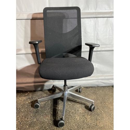 302 - Set of four black adjustable office chairs.