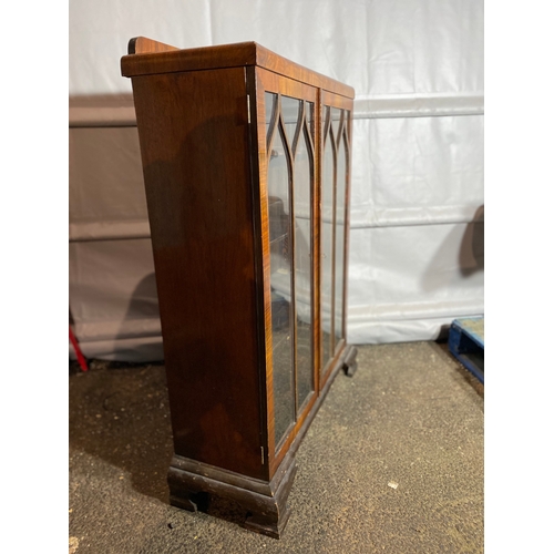 306 - 1930's Glazed Glass front bookcase. 

Dimensions - 33