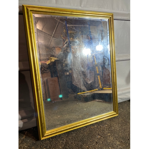 307 - Large gilded frame bevelled glass mirror.

Dimensions - 45