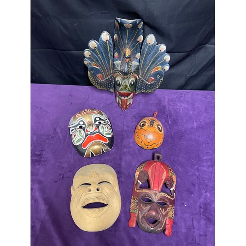 26 - Collection of Oriental / Asian Tribal masks / wall hangings