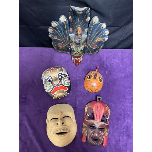 26 - Collection of Oriental / Asian Tribal masks / wall hangings