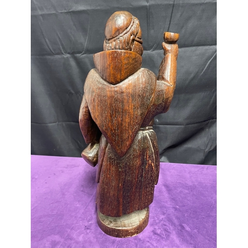 52 - Hand carved sculptor of a monk toasting - 52cm