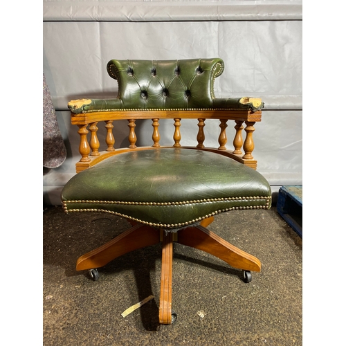 343 - Vintage Green leather Chesterfield style captains chair.