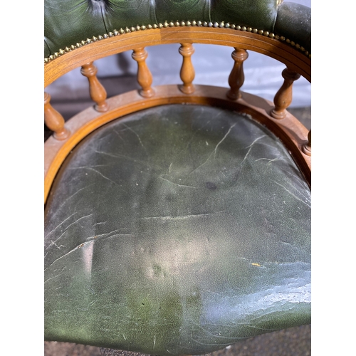 343 - Vintage Green leather Chesterfield style captains chair.