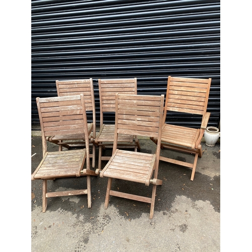 352 - Teak Set of Five foldable garden chairs.