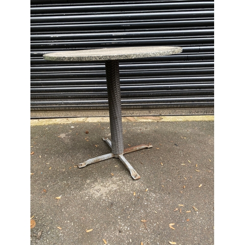 363 - Marble top (removable) garden table with metal stand. 

Dimensions - Circumference 29.5