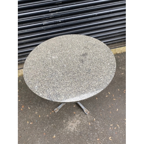 363 - Marble top (removable) garden table with metal stand. 

Dimensions - Circumference 29.5