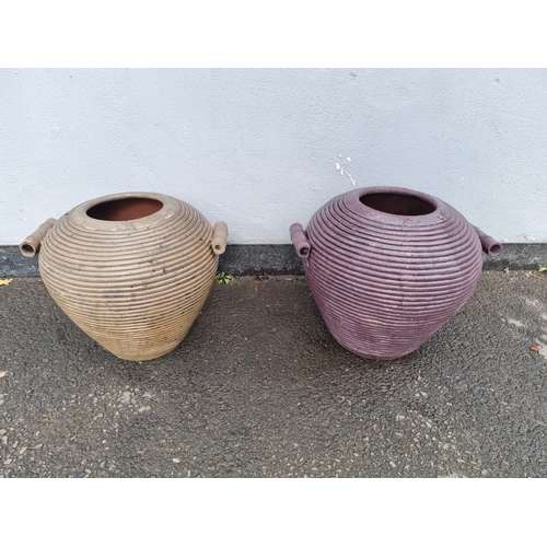 374 - Two terracotta ribbed flower / garden pots.