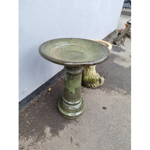 375 - Two small stone garden bird baths.