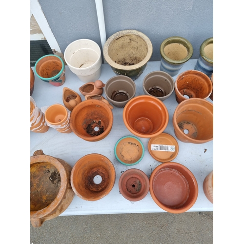 380 - A large collection of various small terracotta  flower / garden