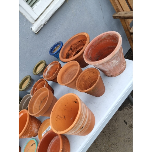 380 - A large collection of various small terracotta  flower / garden