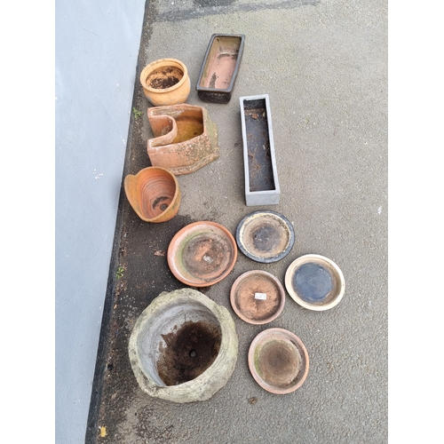 385 - A selection of miscellaneous terracotta  flower / garden pots and bases