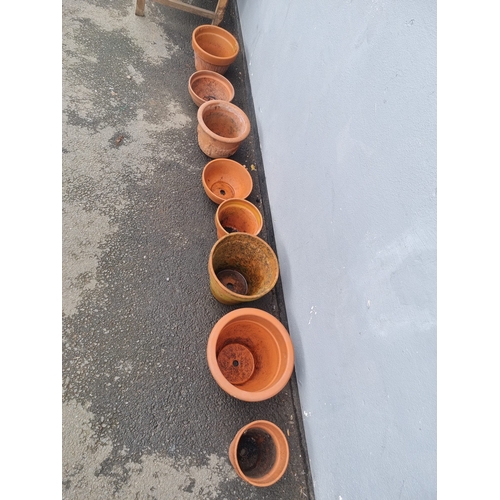 386 - A selection of small miscellaneous terracotta flower / garden pots