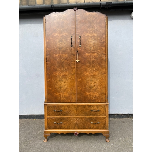 272 - 20th century walnut wardrobe with two drawers and top storage. 

Dimensions - 21