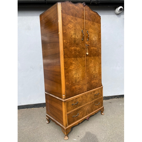 272 - 20th century walnut wardrobe with two drawers and top storage. 

Dimensions - 21