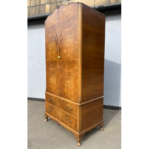 272 - 20th century walnut wardrobe with two drawers and top storage. 

Dimensions - 21