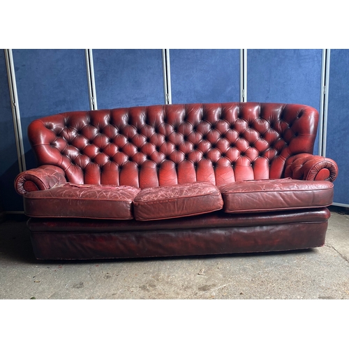 275 - Crimson Leather Chesterfield Three Seater sofa

Dimensions - 36