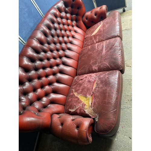 275 - Crimson Leather Chesterfield Three Seater sofa

Dimensions - 36