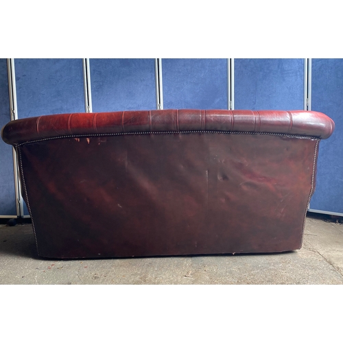 275 - Crimson Leather Chesterfield Three Seater sofa

Dimensions - 36